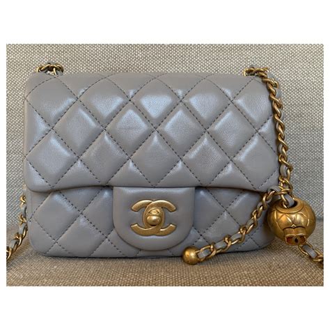 chanel grey handbag.